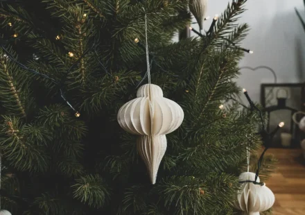 Paper ornament hanging on a Christmas tree